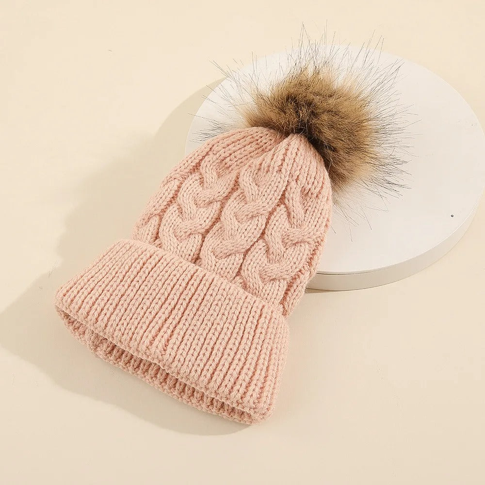 Rosa Babymütze mit Bommel