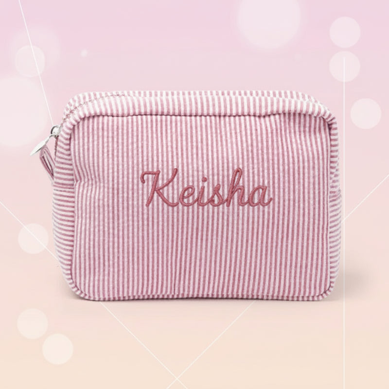 Rosa Kulturtasche mit dem gestickten Namen Keisha