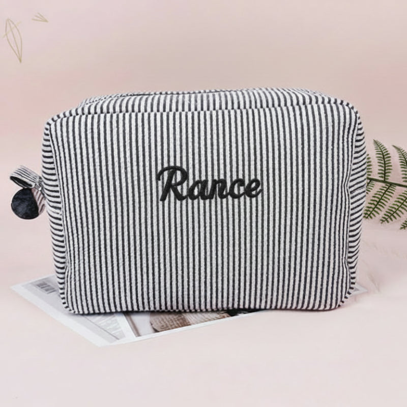 Schwarz-weiße Kulturtasche mit dem Namen Rance