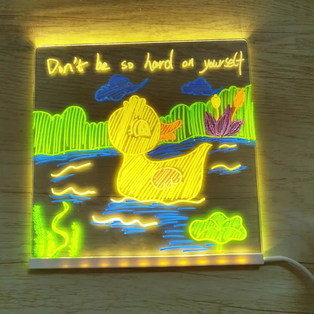 Eine Zeichnung leuchtet auf der durchsichtigen Acryltafel