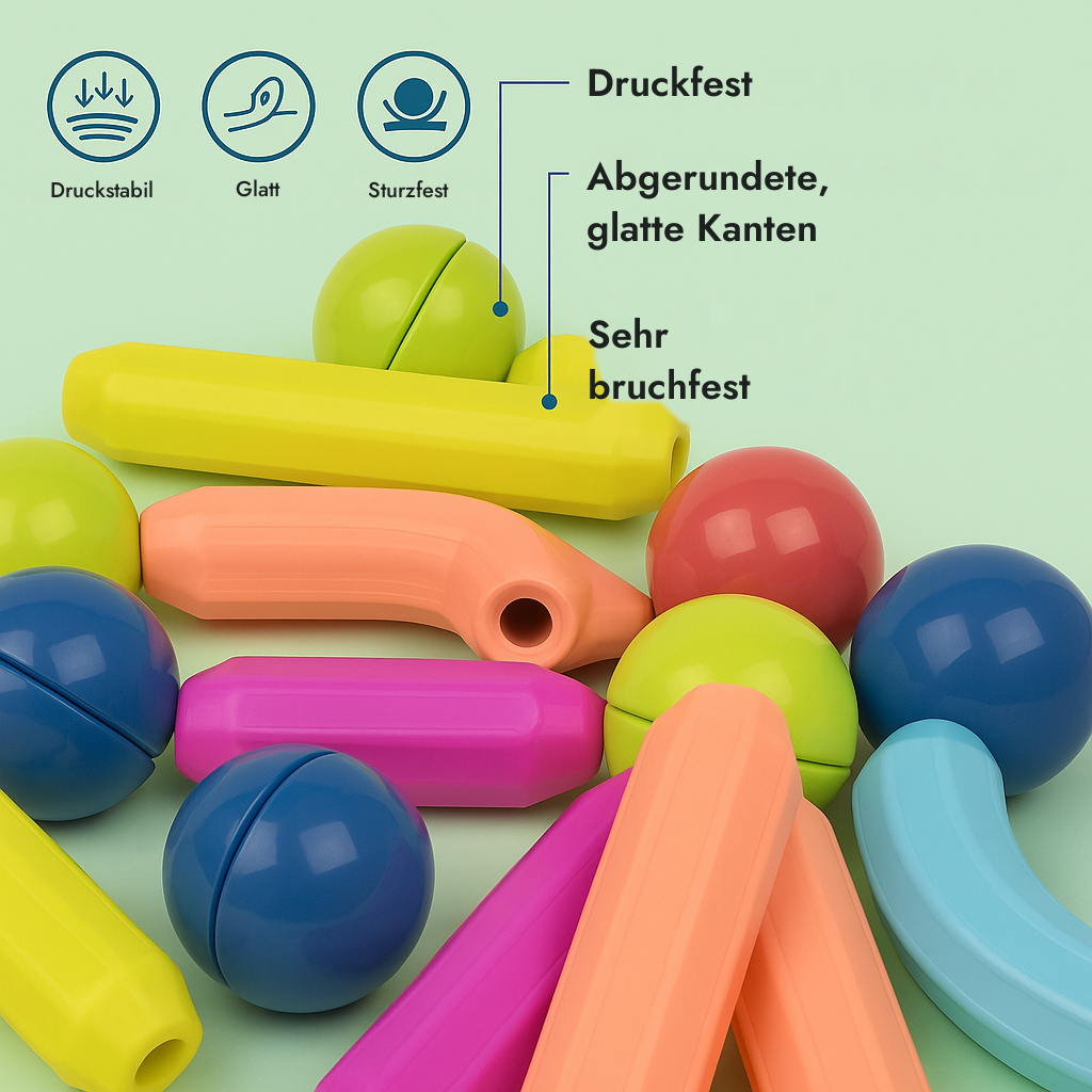 Die dicken Stäbe und die Kugeln von 4 cm in der Hand