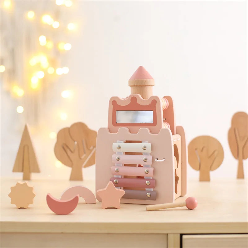 Montessori Burg aus Holz mit Xylophon, Formklötzen und Rechenschieber