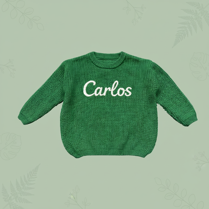 Grüner Pullover mit dem Namen Carlos