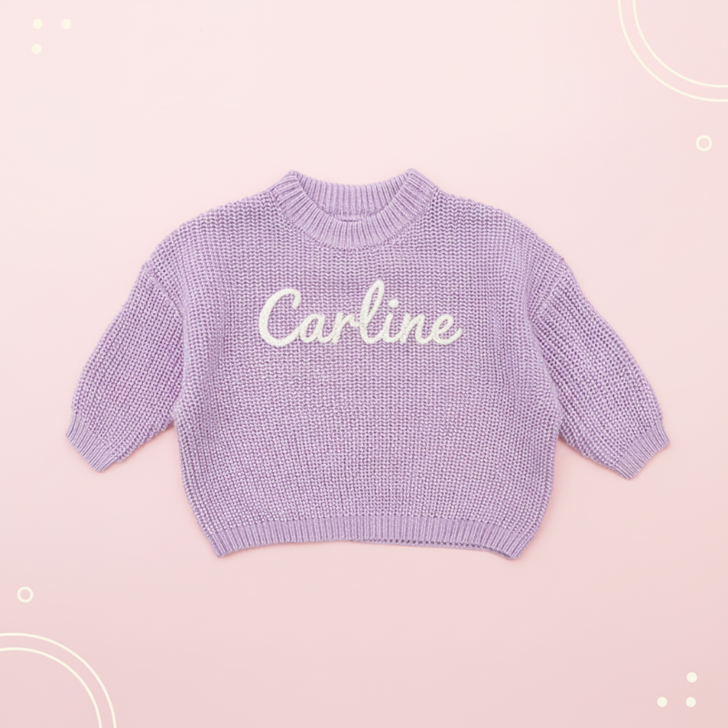 Lila Pullover mit dem Namen Carline